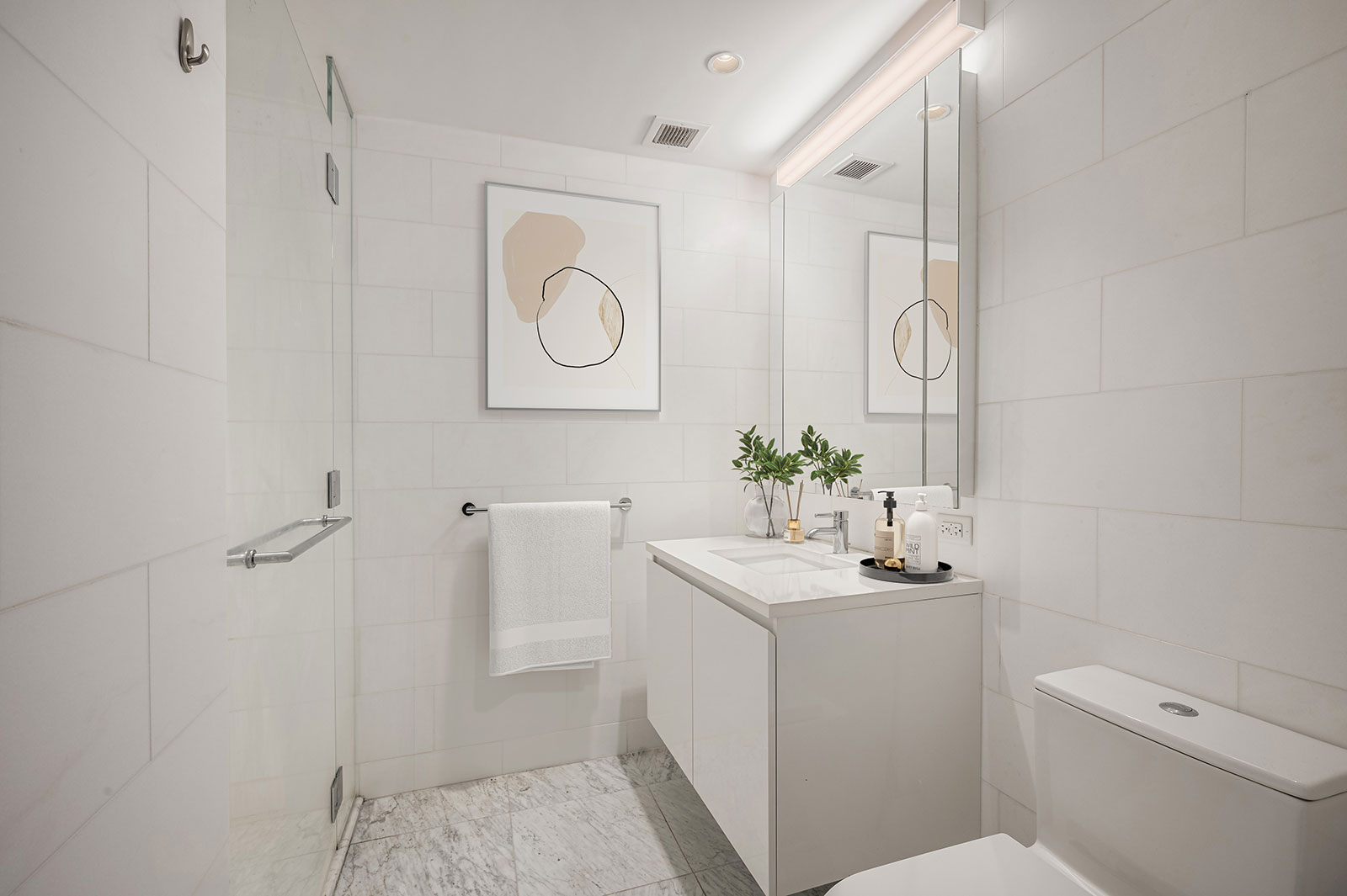 Modern bathroom with white countertops and sleek finishes at 685 First Avenue, Murray Hill luxury rentals in NYC.